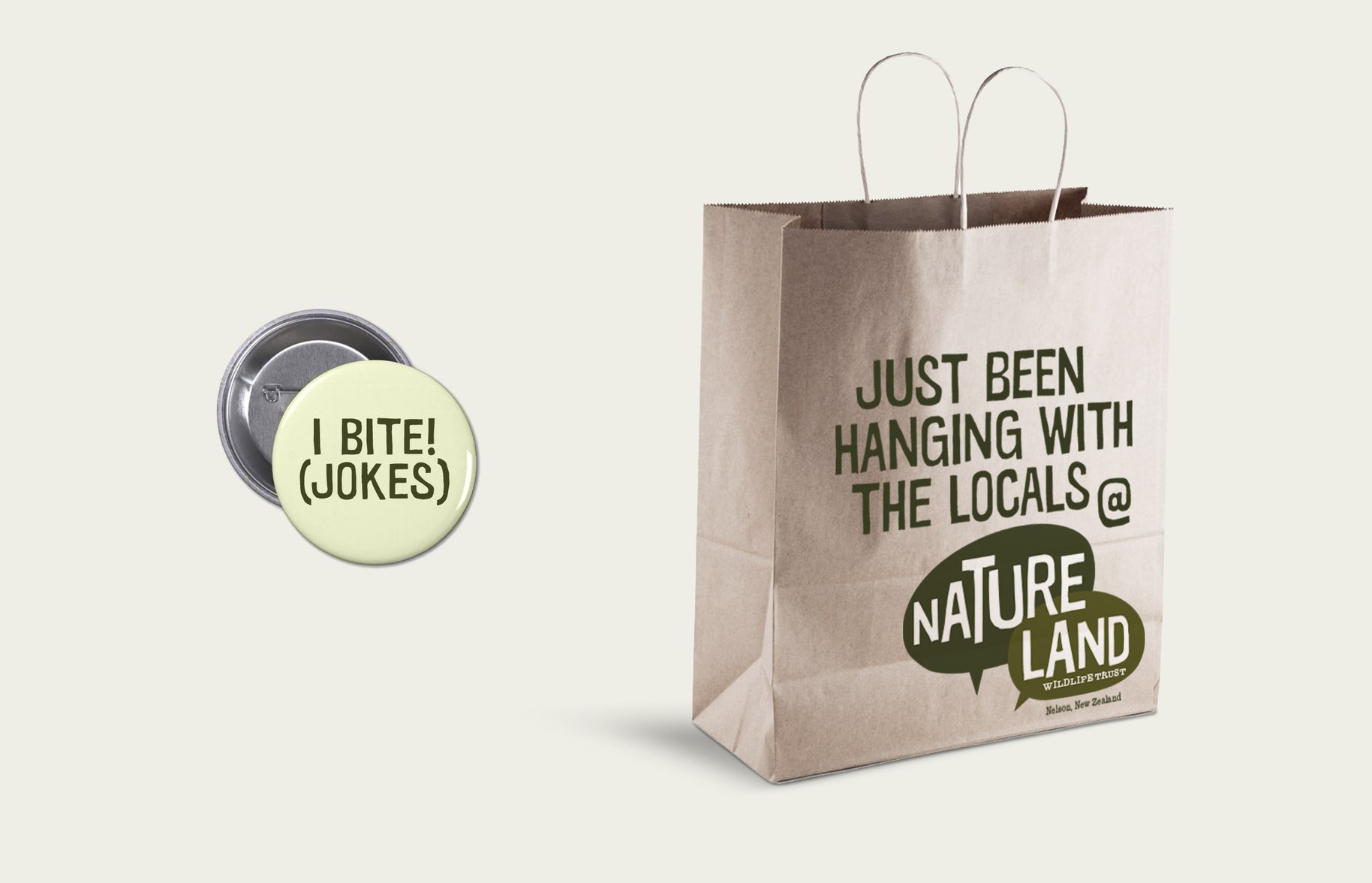 Natureland branded gift bag and pin