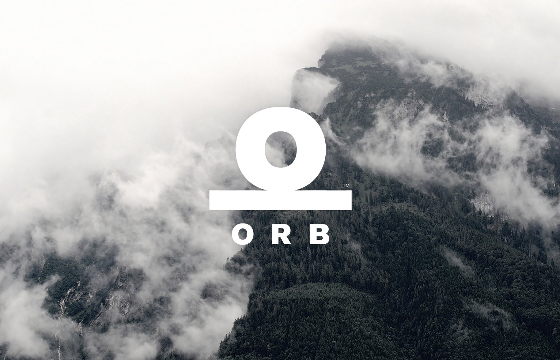 Orb logo overlay on mountain photography